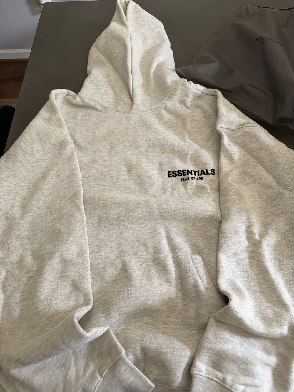 Essentials Light Heather Gray Pullover Hoodie with Black Logo